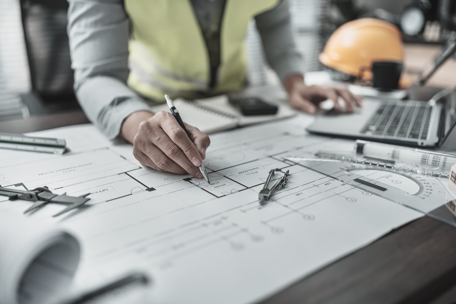 Engineering working with drawings inspection and writing on Blueprint. Engineer, Architect concept.